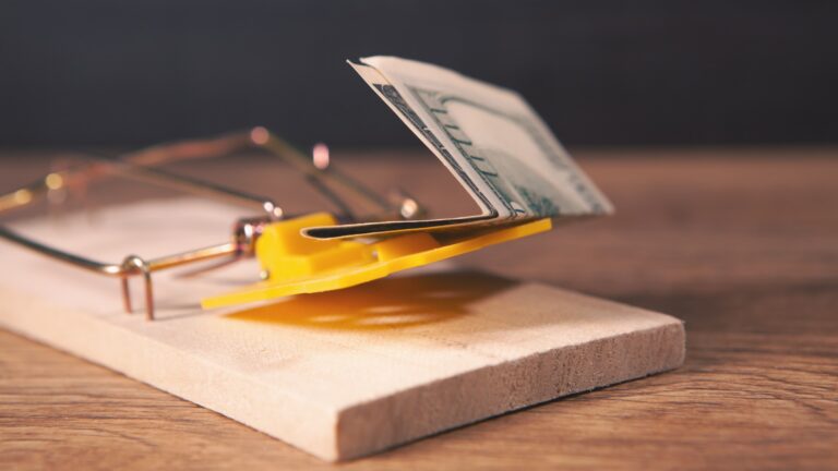 Dollarschein mit Holzfalle